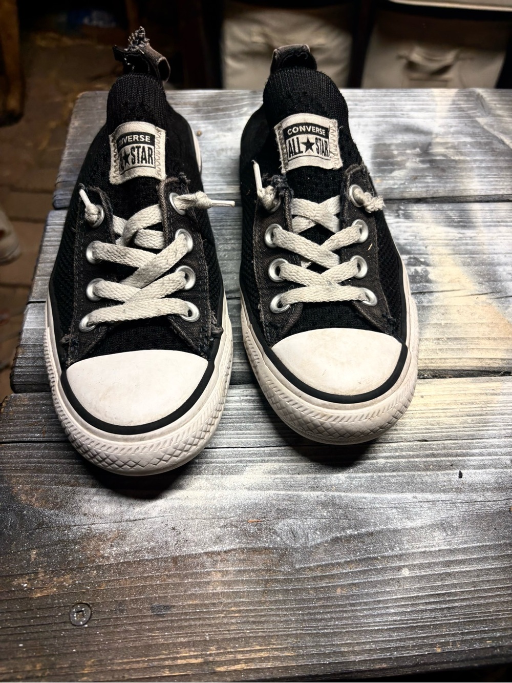 Black Converse sneakers with white rubber toe cap and sole Womens 5